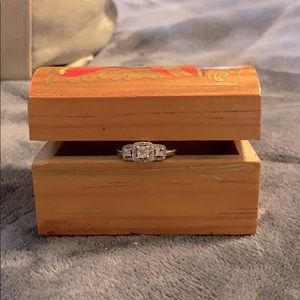 A sterling silver three tier Diamond accent ring!